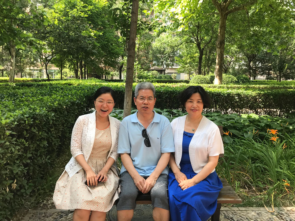 Me (left) with my parents, back home, after passing my qualification exam. My mom and dad are the source of all my strengths, and I can't thank them enough.