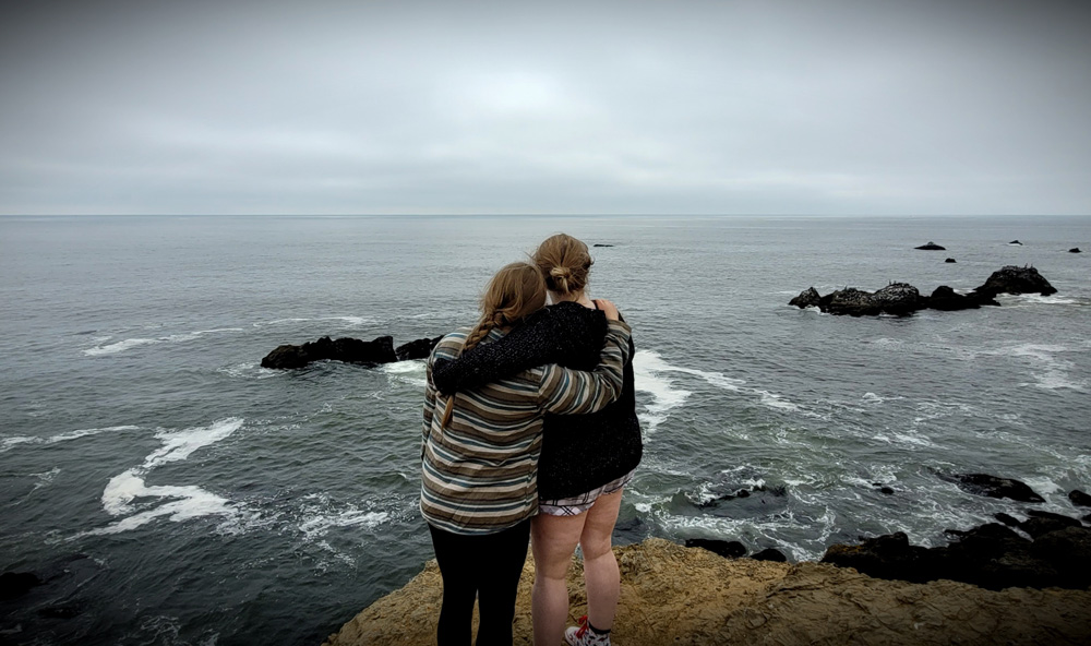 Me (right) with my sister Alex Garrett (left) overlooking the Pacific Ocean.