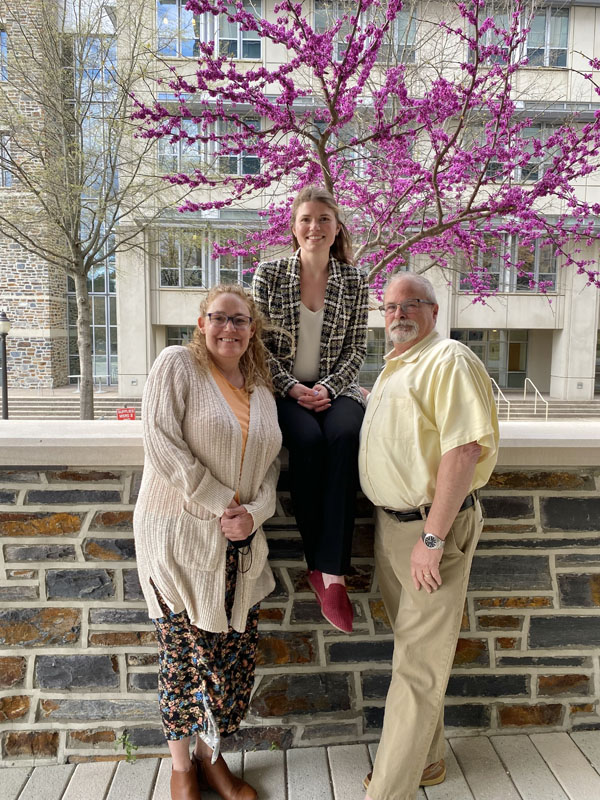 Me (center) with my parents, Diana and Mike, after defending my dissertation