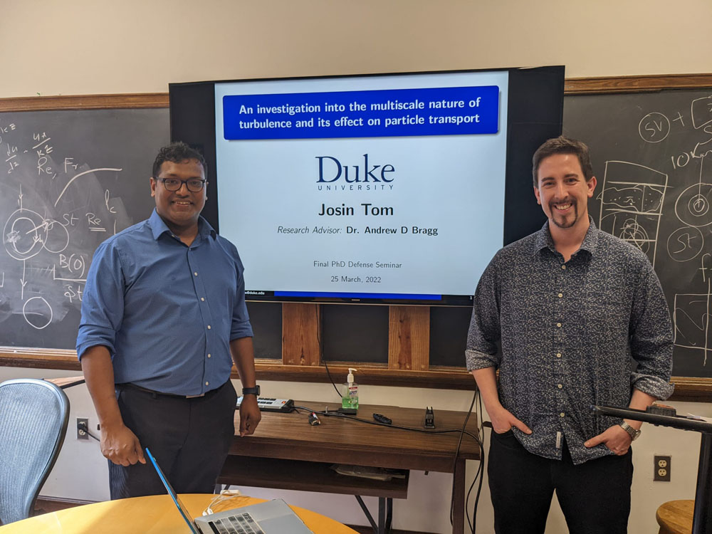 Me (left) with my adviser Andrew Bragg (left) after defending my dissertation.